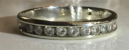 Diamond and white gold half eternity ring